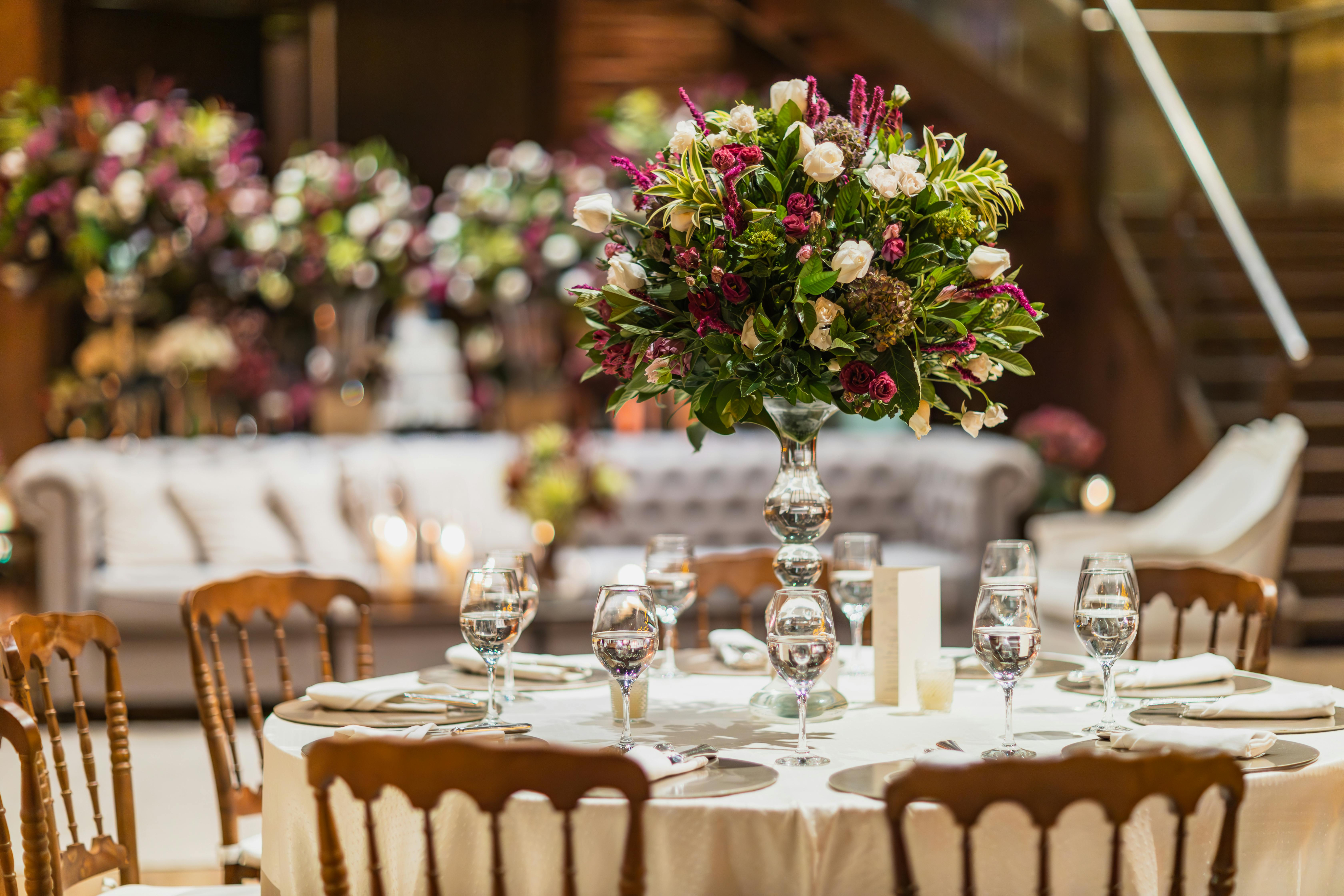 Elegant wedding table setup with floral centerpiece