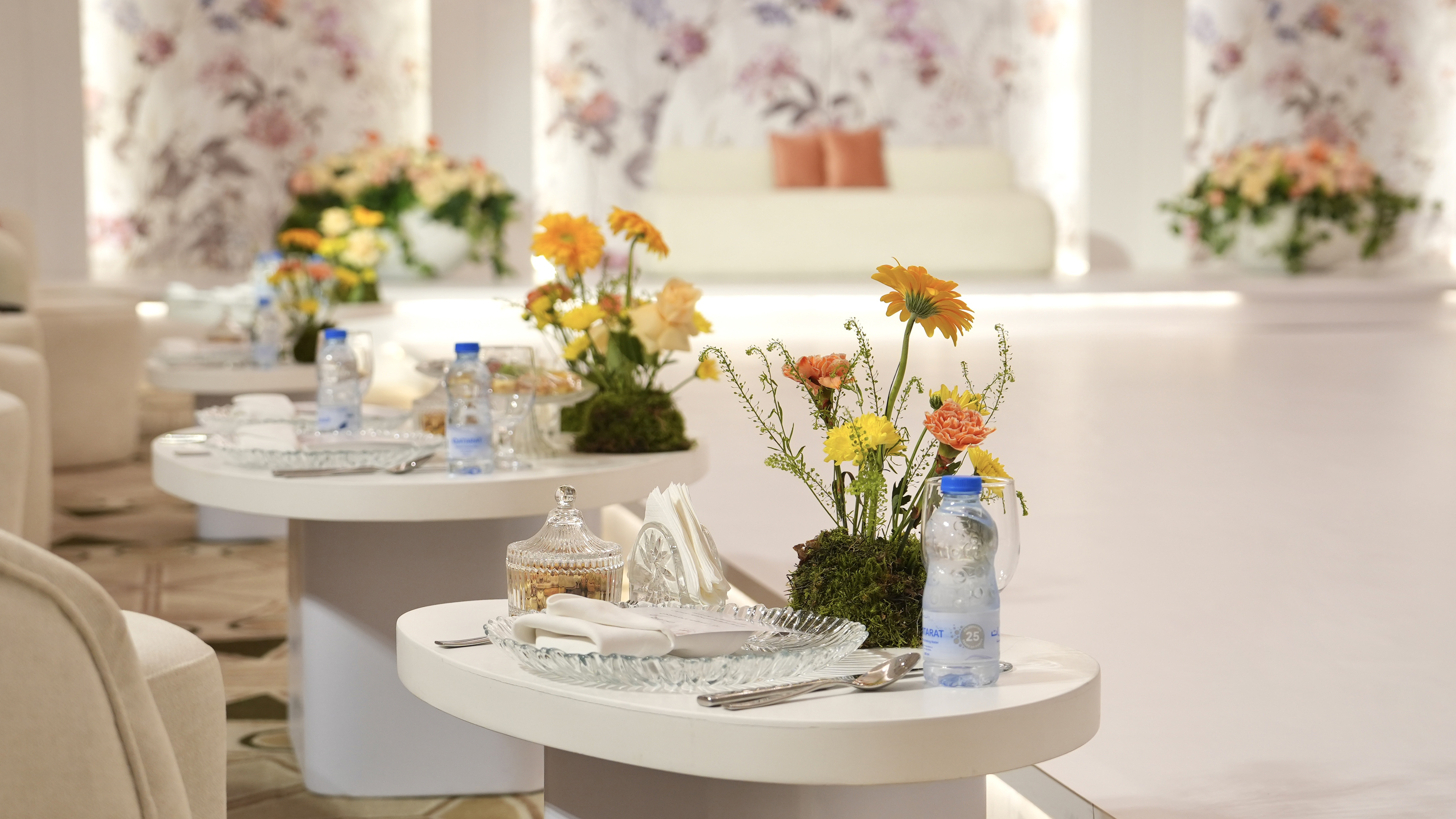 Elegant wedding table setup with floral centerpiece